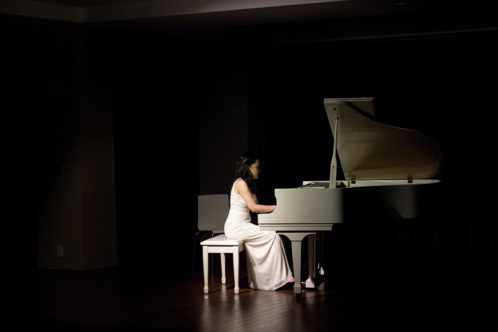 Piano tuners in South Hill carefully adjust the tension of each string to bring it into harmony with the others.